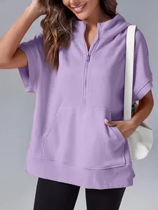Detail view of a lavender purple short sleeve hooded sweatshirt with front zipper and pocket