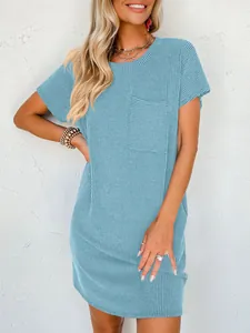 Close-up view of light blue ribbed knit dress featuring a classic front pocket detail