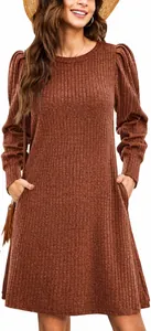 Close-up view of a rust brown ribbed knit mini dress with puff sleeves and side pockets