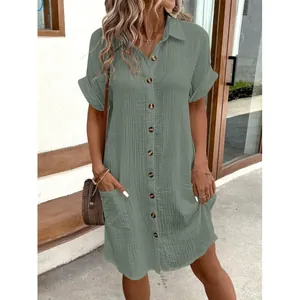 Casual summer green cotton linen button-down shirt dress with pockets and short sleeves