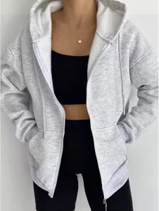 Vista detallada de la sudadera con capucha gris jaspeado extragrande para mujer con cremallera