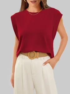 Detail view of a casual red cap sleeve top for women with a round neckline