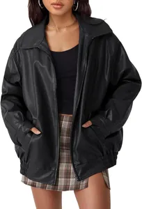Detail of women's oversized black faux leather biker jacket shown on a fashion model.
