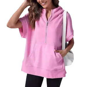 Women's minimalist pink short sleeve half-zip hooded sweatshirt with kangaroo pocket