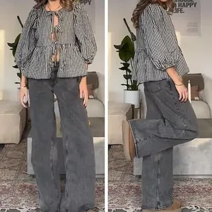 Front and side view of black gingham puff sleeve tie-front peplum shirt blouse
