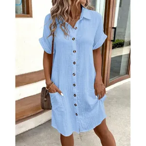 Casual light blue V-neck cotton linen shirt dress with pockets and button detail