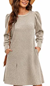 Detailed view of women's beige puff sleeve ribbed knit dress with side pockets