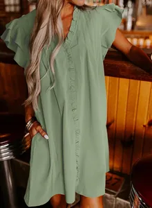 Detail of sage green V-neck ruffle sleeve dress with loose fit and side pockets.
