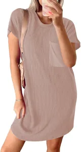 Close-up of casual short sleeve dress showing the mauve ribbed fabric and pocket detail.