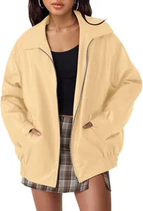 Womens oversized beige faux leather motorcycle jacket with front zipper and pockets