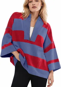Close-up view of women's oversized red and blue striped half-zip sweatshirt with V-neck