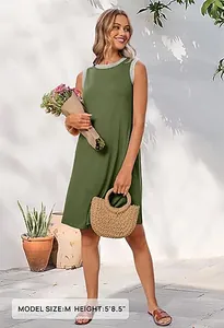Detailansicht eines olivgrünen ärmellosen Sommerkleids an einem Modell im Garten
