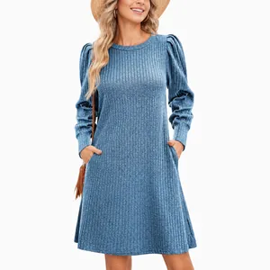 Elegant women's light blue knit dress featuring puff long sleeves and casual round neck design