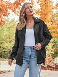 Oversized black faux leather motorcycle jacket with casual autumn outdoor style