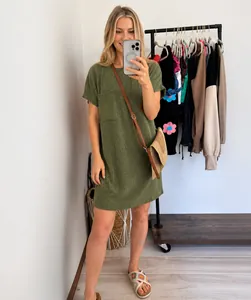 Casual women's green ribbed short sleeve mini dress with a functional chest pocket