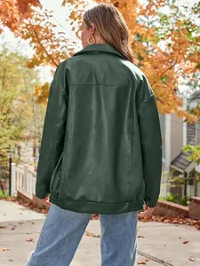Back view showing the relaxed fit and texture of an oversized dark green faux leather jacket