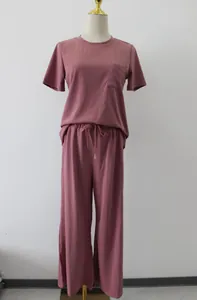 Front detail view of a dusty pink women's two-piece lounge set on a mannequin.