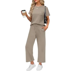 Detailed view of women's casual two-piece set with short-sleeve top and wide-leg pants
