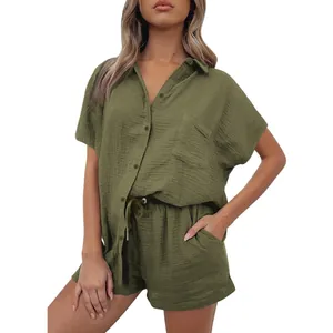 Detailed view of women's casual olive green cotton linen shirt and shorts set