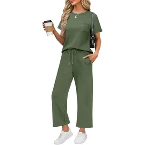 Full view of women's olive green 2-piece lounge set featuring short sleeve pocket tee and pants