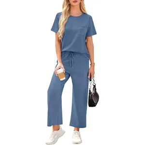 Full body view of a stylish blue two-piece casual set with short sleeve tee and wide leg pants