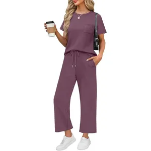 Casual 2-piece women's purple loungewear set with pocket tee and wide-leg trousers
