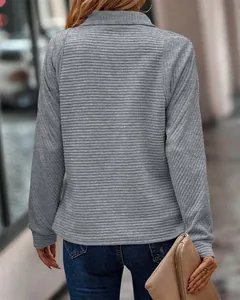 Detailed back view of a gray snake-bone textured stand collar sweatshirt for women