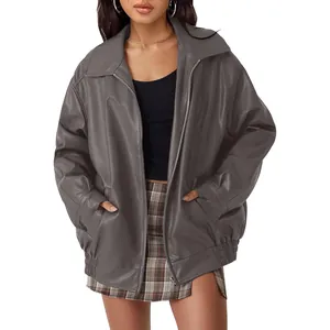Oversized women's faux leather biker jacket in charcoal grey with zip-up design