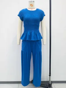 Elegant blue two-piece set with smocked ruffle top and loose casual mid-waist pants