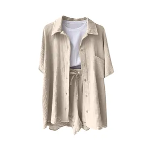 Lightweight beige cotton linen two-piece set with a button-down shirt and matching shorts.
