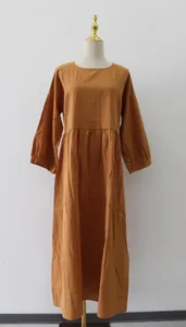 Casual loose long-sleeve brown cotton linen maxi dress displayed on a white mannequin