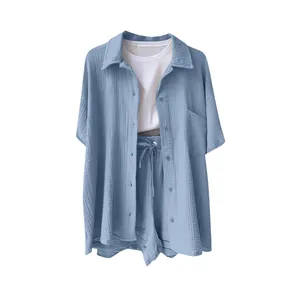 Detailed view of women's light blue casual cotton linen shirt and drawstring shorts set