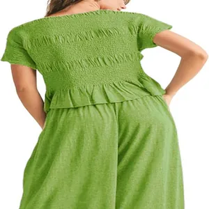Detailed back view of green smocked top and wide-leg pants set showing fabric texture.