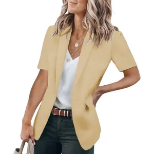 Detail view of stylish summer short-sleeved yellow blazer on a model for casual look