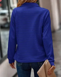 Back view detail showing the unique snakebone ribbed texture of this royal blue women's sweatshirt