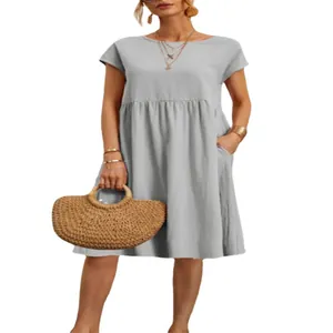 Elegante abito a trapezio in cotone grigio con scollo rotondo e tasche per l'estate