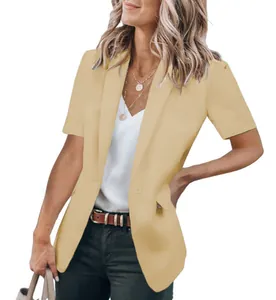 Detail of a stylish pale yellow short-sleeved blazer for women with a notched lapel