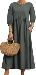 Detail view of a loose grey cotton linen maxi dress with long sleeves and pockets