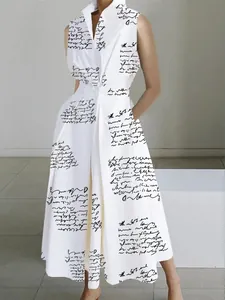 Elegant detail view of a white V-neck sleeveless maxi dress with black script print.