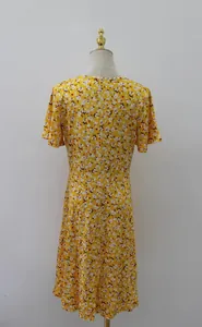 Back view of yellow summer floral short sleeve A-line midi dress