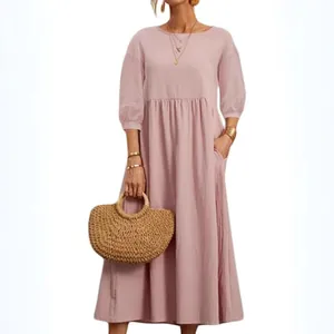Casual pink cotton linen midi dress with long sleeves and pockets for bohemian style