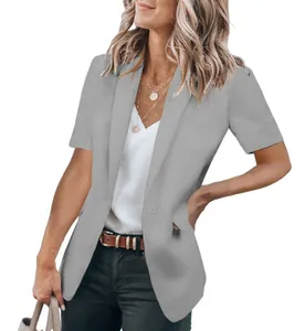 Close-up of a stylish grey short-sleeve blazer for women featuring a casual, modern fit