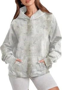Detail view of a women's hoodie with a grey tie-dye print and a large kangaroo pocket.