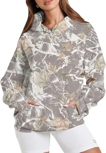 Close-up showing the intricate all-over maple leaf pattern on this women's casual hoodie.