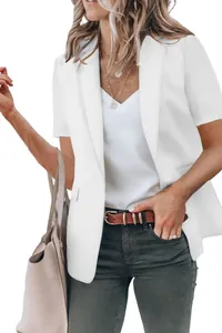 Detail view of a white short-sleeved blazer for women, ideal for a summer chic look