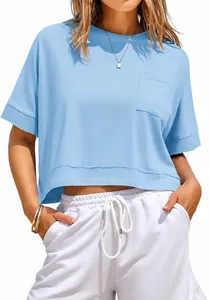 Light blue oversized cropped t-shirt for women featuring a functional front pocket.