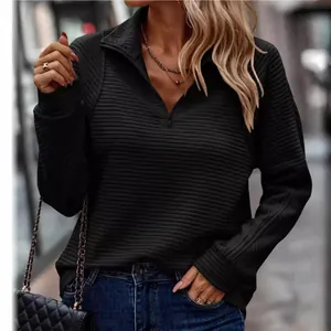 Women's black ribbed half-zip sweatshirt with long sleeves and loose fit design