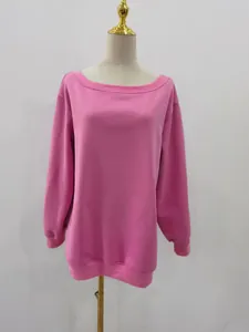 Detailed view of pink boat neck long sleeve sweatshirt on mannequin for casual style