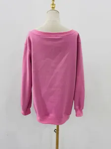 Back view detail showing the pink solid color slash neck sweatshirt on a mannequin