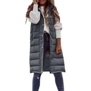 Detail view of a stylish long dark grey hooded quilted vest worn by a female model.